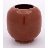 A Chinese 'iron-rust' glazed vase: of squat globular form with short cylindrical foot rim,