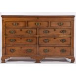 A George IV mahogany mule chest:, the hinged top with a moulded edge,