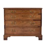A George III mahogany rectangular chest:, the top with a moulded edge,