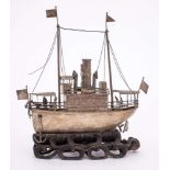 A Chinese silver model of a Yangtze river steamer: with tall funnel,