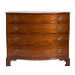 A George III mahogany serpentine-fronted chest:, the top with a moulded edge,