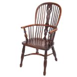 A 19th Century yew wood and elm stick back windsor elbow chair:,