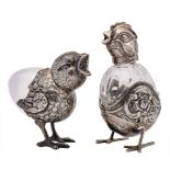 A Continental clear glass and silver mounted scent bottle, stamped 800: in the form of a chick 6.