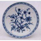 A Bristol blue and white small strainer: painted with two flowering sprays within a lattice border,