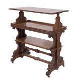 A Victorian carved oak and parquetry three tier harlequin dumb waiter:,