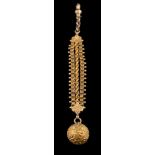 A late 19th Century gold watch fob: with foliate chased spherical fob,