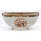 A Chinese Export famille rose bowl: painted in the Mandarin palette with three medallions depicting