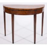 A George III mahogany and inlaid half round card table:,