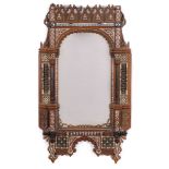 A pair of Damascus inlaid beech wall mirrors: of arched design, inlaid with mother of pearl,