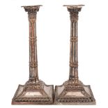 A pair of 19th Century Sheffield Plate candlesticks,