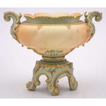 A Royal Worcester porcelain blush-ivory pedestal jardiniere: of spiral lobed form with green ground