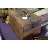 An early 20th century brown pigskin Gladstone bag style vanity case: with fitted interior and