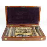 An early 20th century mahogany cased options optometrist test set: stamped 'Eduard Messier,
