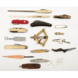 A collection of various penknives: including a Bakelite shoe (damaged) a silver penknife by George