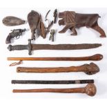 A French model 1862 side arm in excavated condition:, together with three root wood clubs,