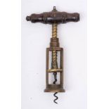 A 19th Century brass double bar corkscrew: the turned rosewood handle over an open frame body with