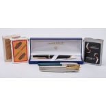 A Waterman black and gilt fountain pen with 18ct gold nib in original box: together with a Parker