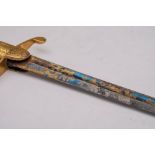 A Georgian Royal Navy Midshipman's short sword: the straight single edge fullered blade with gilt