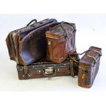 A group of four various leather suitcases and holdall's: (4)