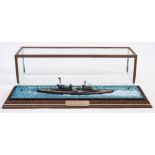 A cased waterline model HMS Invincible: with detailed decks on a painted base within a glazed case ,