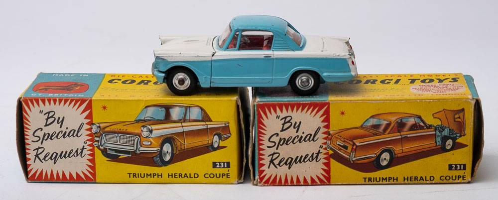 Corgi 231 Triumph Herald Coupe: white and blue body, red interior, spun hubs,