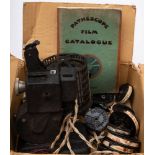An early 20th century Pathescope hand cranked projector: numbered 'Z37515' with caged transformer,