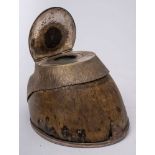 An early 20th Century silver plate mounted horseshoe inkwell inscribed 'Marvel':, 15cm long.