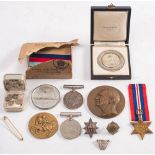A small group of militaria including a WWI war Medal to 'Capt J B Bolithio': A 1939-45 war Medal,