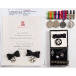 An Elizabeth II Order of St John to Mrs Elsie Nisbet: Serving Sister medal , and breast badge,