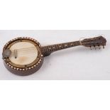 A Ruggero eight string mandolin banjo: with mother of pearl fret markers and geometric bone inlaid