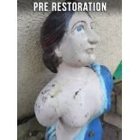 A late 19th century carved figurehead of 'Diana': with brown hair over painted face and blue dress