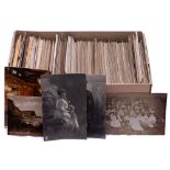 A collection of early 20th century and later photographic portrait postcards: mostly WWI military