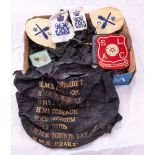 A group of Royal Navy hat tallies and shoulder badges: including HMS King George V, HMS Cambridge,