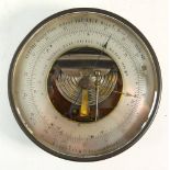 A French circular Holosteric Barometer by HPBN: with silvered dial in a lacquered case,