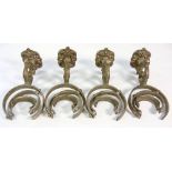 A set of four early 20th century cabin brass gimbled candle wall light fittings,