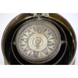 A late 19th /early 20th Century mahogany and brass binnacle: the 3 1/2 inch dry card compass in a