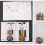 A WWI pair to '34970 Pte S Cowd Hamp's R' together with two cap badges:.