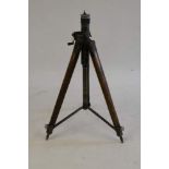 A mid-20th Century oak and brass mounted tripod: the metalware overpainted in a Naval grey colour,