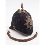 A Victorian British Army regulation pattern Army Service Corps blue cloth helmet by Hawkes & Co,