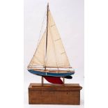 A scale model pond yacht 'Caledonian': fully rigged over planked deck with fittings,