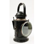 A GWR signal lamp: with oil burner a rotating red/blue shade,