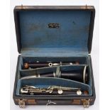 A French rosewood clarinet by J Thibouville Lamy: No 31330 signed as per title with silver plated