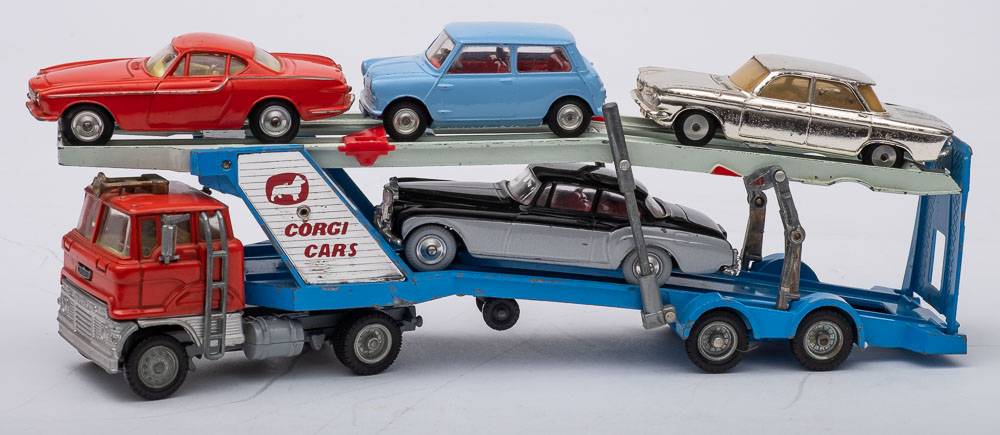 An unboxed group of five Corgi vehicles:, 228 Volvo P1800, 229 Chevrolet Corvair,