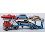 An unboxed group of five Corgi vehicles:, 228 Volvo P1800, 229 Chevrolet Corvair,