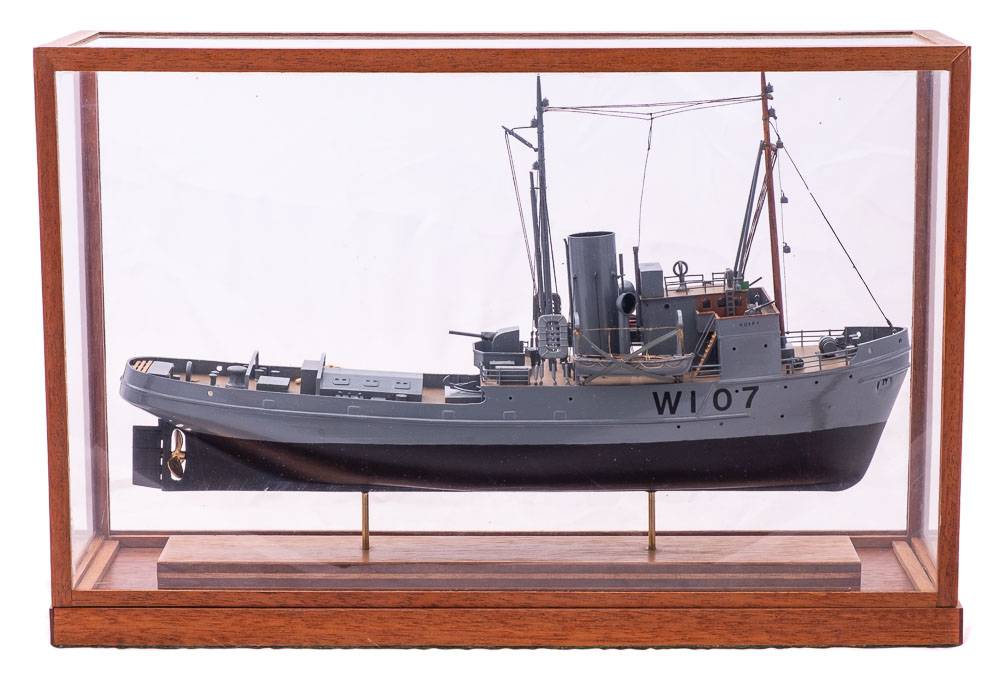 A scale model of the Royal Navy Assurance-Class Rescue Tug 'Adept' (W107):,