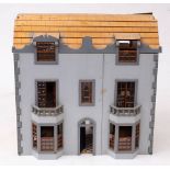 A dolls house in the Georgian style: together with a miscellaneous collection of dolls house