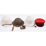 A regulation pattern 9th/ 12th Lancers Officer peaked cap with cloth badge: together with,