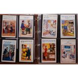 An album of 190 comical postcards relating to shopping: various artists including Donald McGill,
