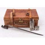 A brown leather cartridge case, unsigned: together with a socket bayonet,