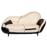 A late 20th Century black and white leather 'Pop-art' style two seater settee and armchair: both